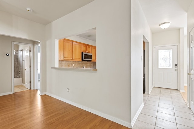 interior space with light hardwood / wood-style floors