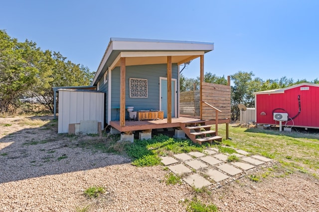 view of outbuilding with a yard