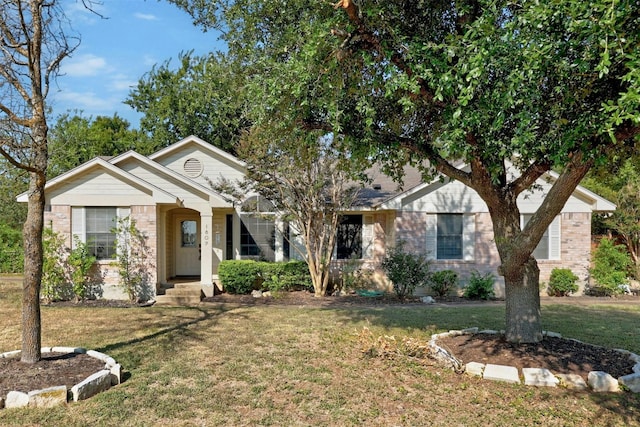 view of front of home with a front lawn