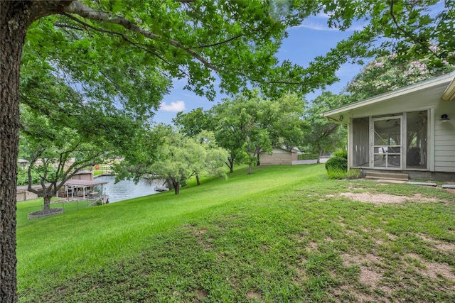 view of yard with a water view