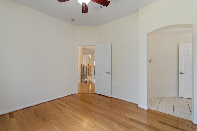 unfurnished bedroom featuring ceiling fan and light hardwood / wood-style flooring