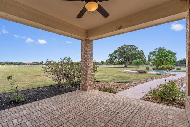 view of patio / terrace featuring ceiling fan