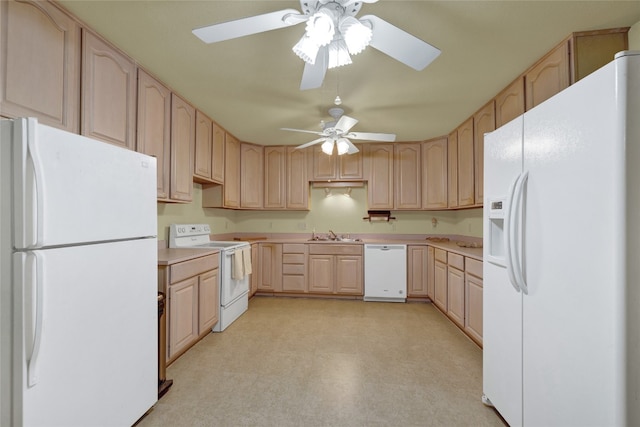 kitchen with ceiling fan, light brown cabinetry, sink, and white appliances