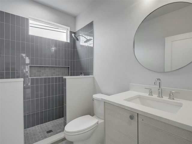 full bathroom with toilet, walk in shower, and vanity