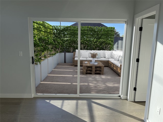 entryway featuring baseboards