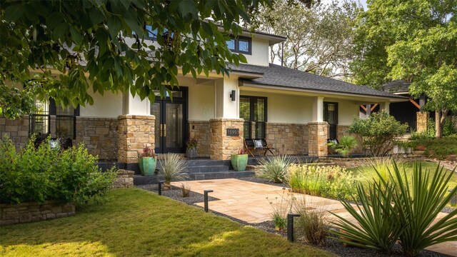 prairie-style house with a front yard