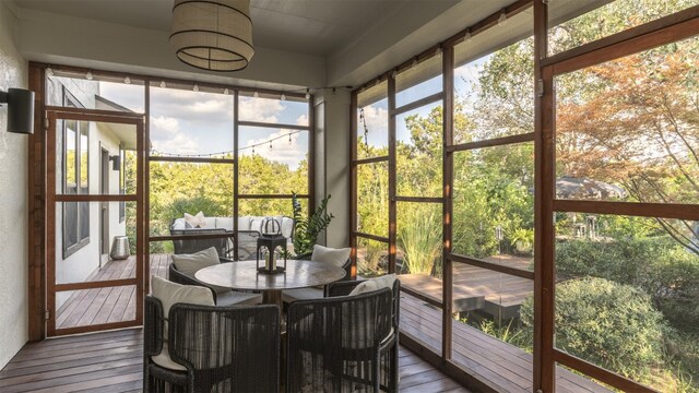 sunroom with plenty of natural light