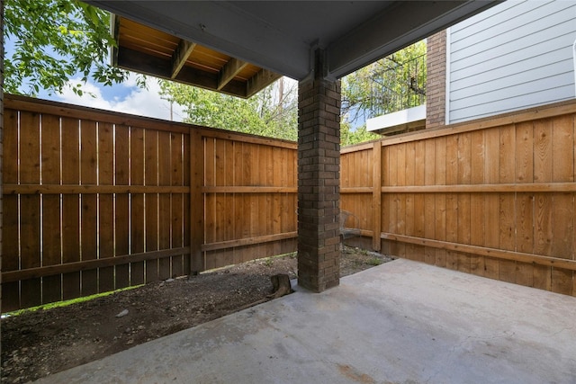 7635 Guadalupe St Unit 103, Austin, TX 78752 - view of patio / terrace featuring fence