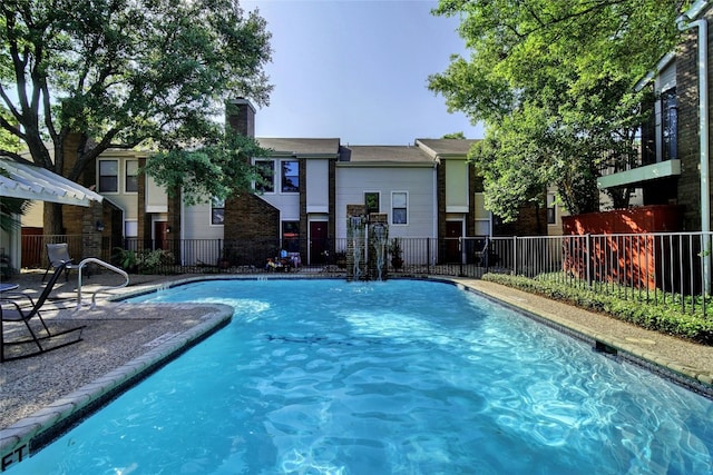 7635 Guadalupe St Unit 103, Austin, TX 78752 - community pool featuring fence
