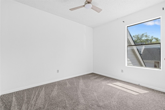 empty room with carpet, a textured ceiling, and ceiling fan