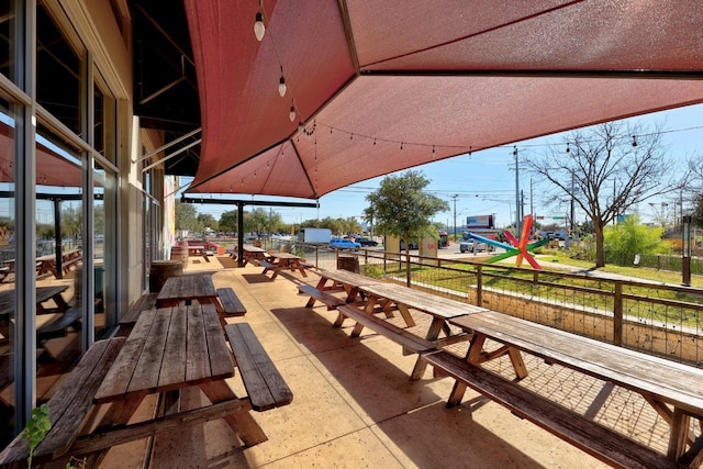 surrounding community featuring a patio area