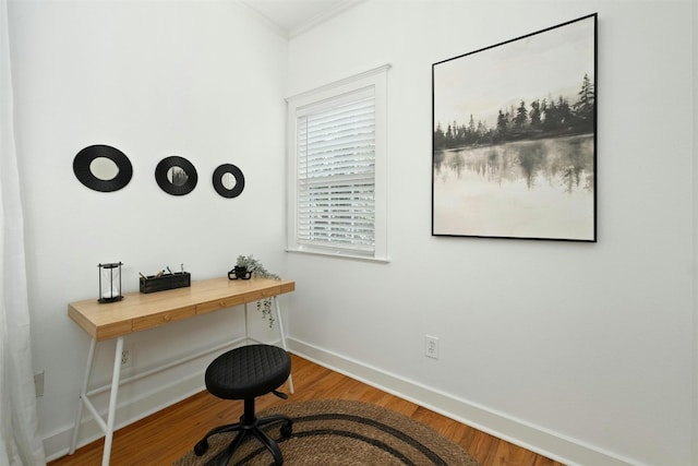 office area with baseboards and wood finished floors