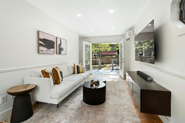 living area featuring recessed lighting and a wall unit AC