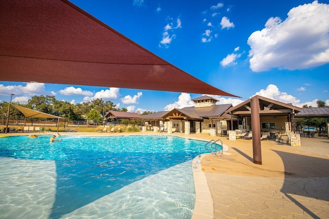 view of pool with a patio area