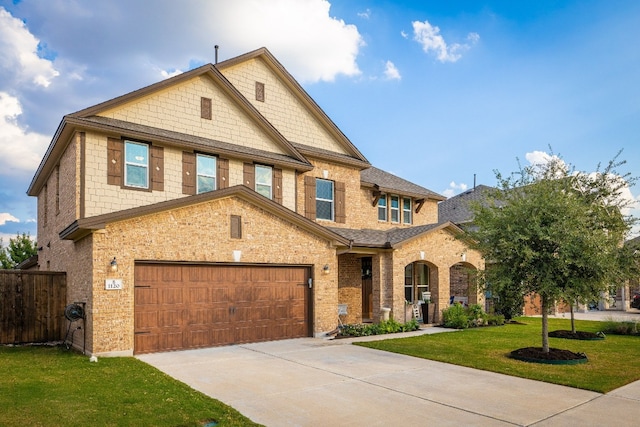 view of front facade featuring a garage and a front yard