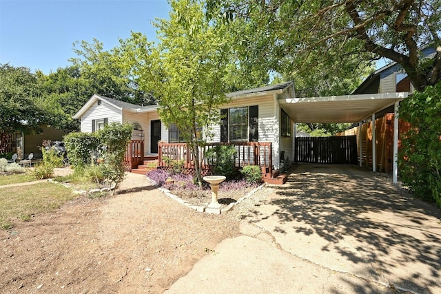 view of front facade with a carport