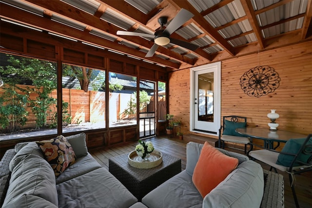 sunroom / solarium with ceiling fan