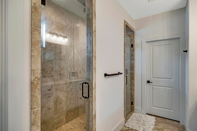 bathroom with an enclosed shower