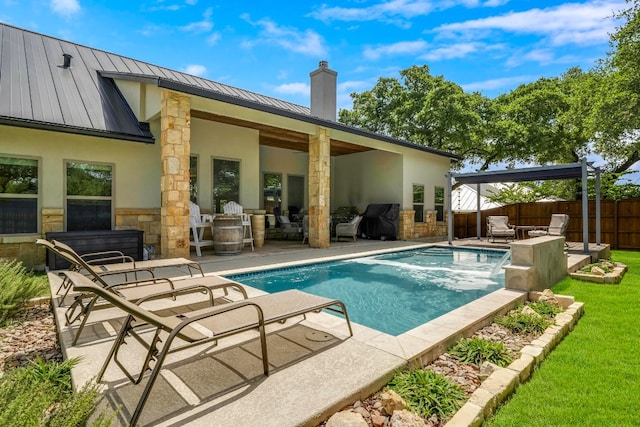 view of pool featuring a patio area