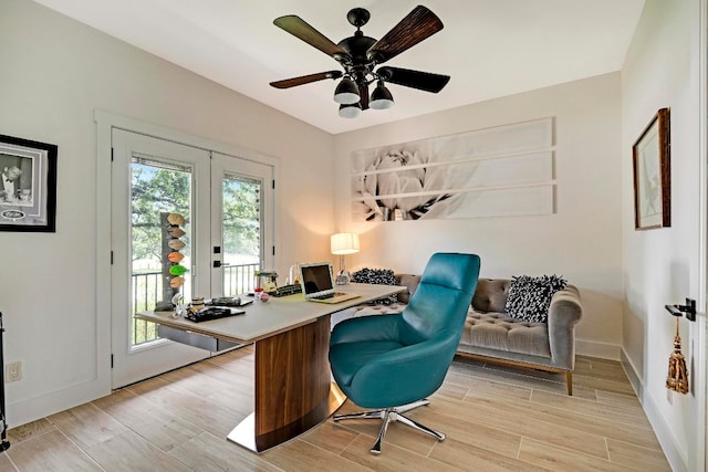 office featuring ceiling fan, french doors, and light hardwood / wood-style floors