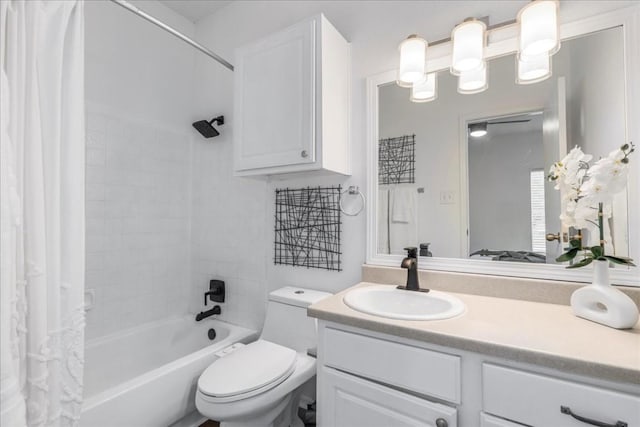 full bathroom with toilet, shower / bathtub combination with curtain, and vanity