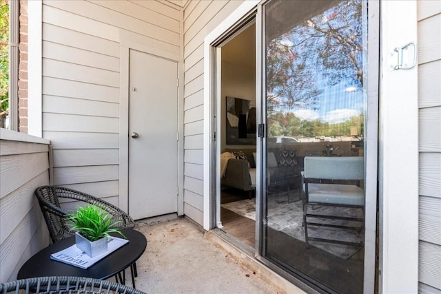 doorway to property featuring a balcony