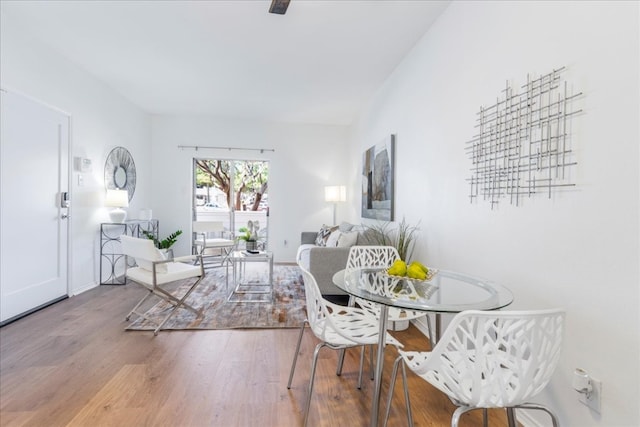 dining area with hardwood / wood-style flooring