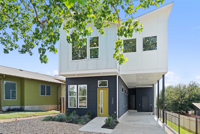 view of front of home with a carport