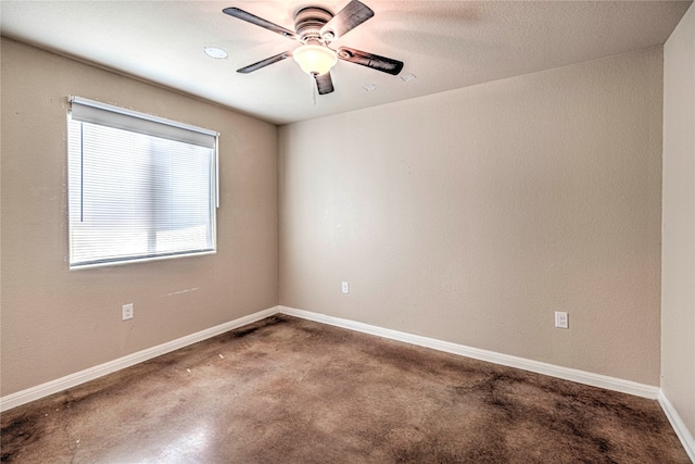 unfurnished room with ceiling fan