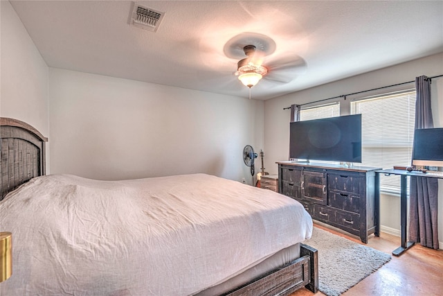 bedroom featuring ceiling fan