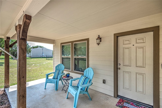 view of patio featuring a porch