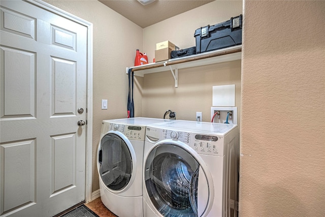 laundry area with separate washer and dryer