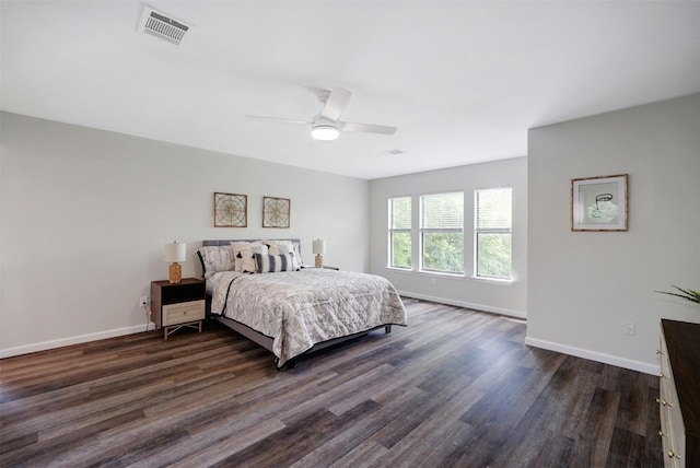 bedroom featuring ceiling fan and dark hardwood / wood-style flooring