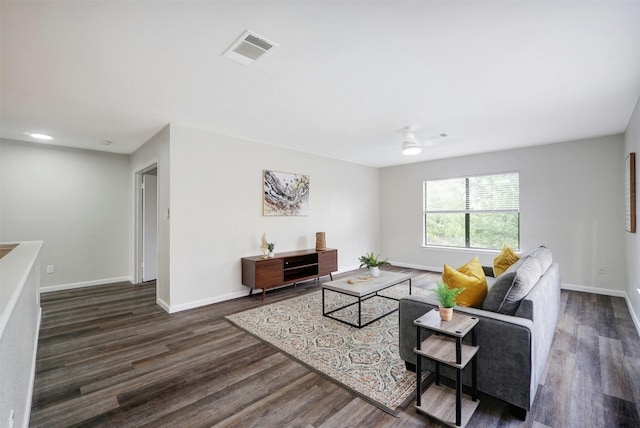 living room featuring dark hardwood / wood-style flooring