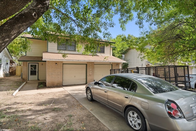 view of property with a garage