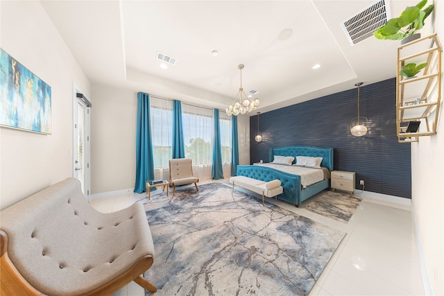 tiled bedroom featuring a notable chandelier and a raised ceiling