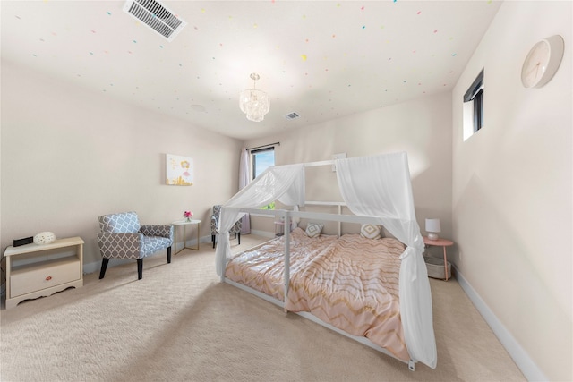 bedroom featuring light colored carpet and a notable chandelier