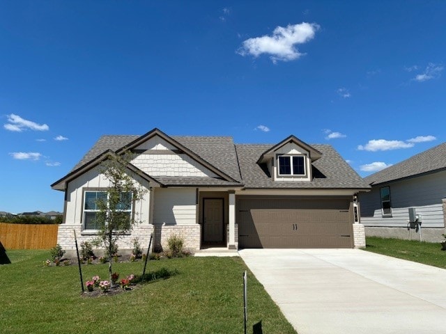 view of front of home with a front lawn