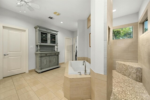 bathroom featuring tile patterned floors, ceiling fan, vanity, and separate shower and tub