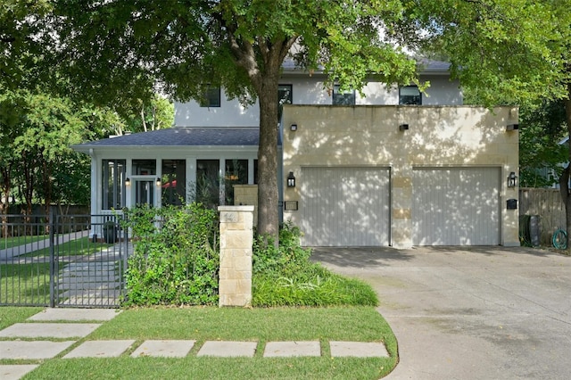 view of front of home with a garage and covered porch