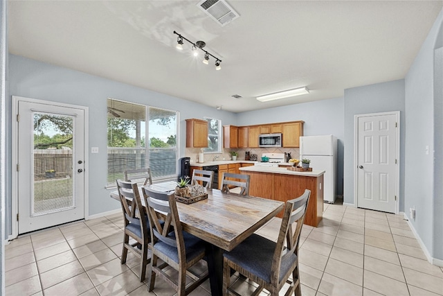 dining room with light tile patterned floors