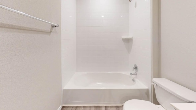 119 Timbo Dr, Jarrell, TX 76537 - full bathroom with toilet, shower / bathtub combination, and wood finished floors