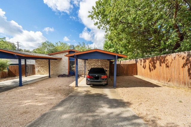 exterior space featuring a carport