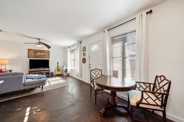 dining area with ceiling fan