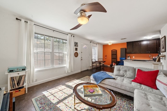 living room featuring ceiling fan