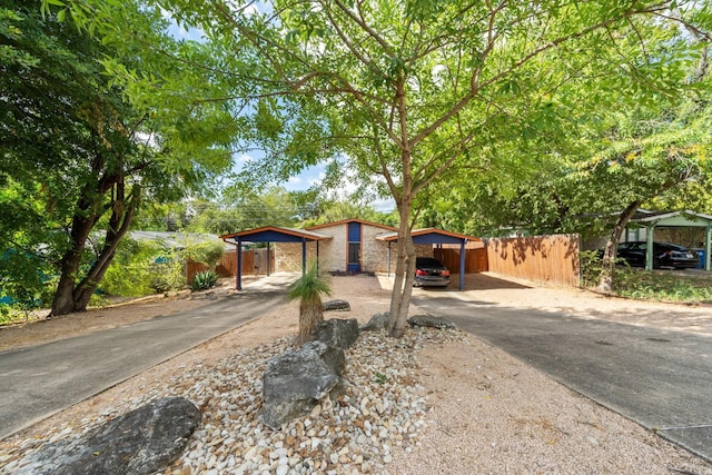 view of front of property with a carport