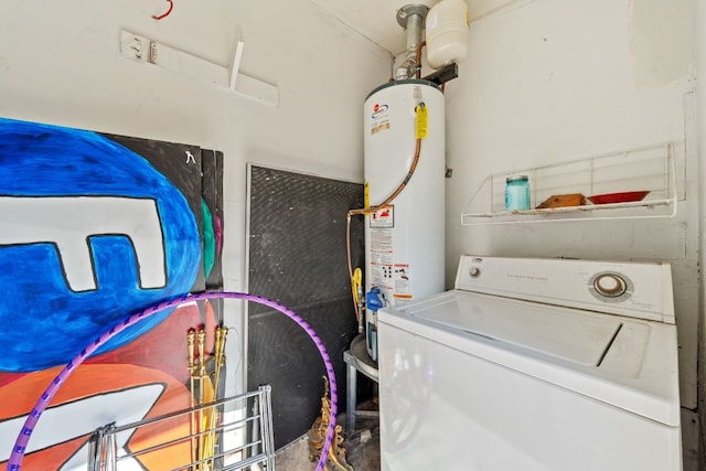 clothes washing area with washer / clothes dryer and gas water heater