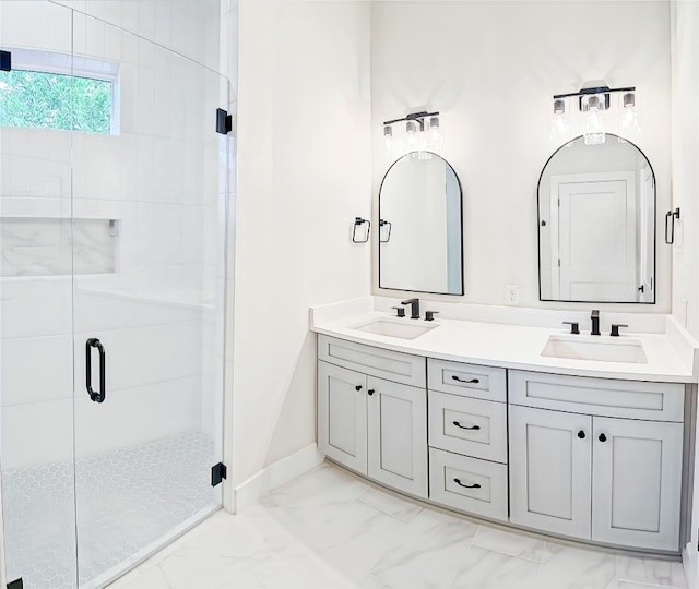 bathroom with walk in shower and vanity