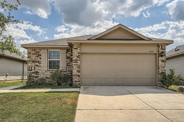 ranch-style home featuring a garage and a front yard