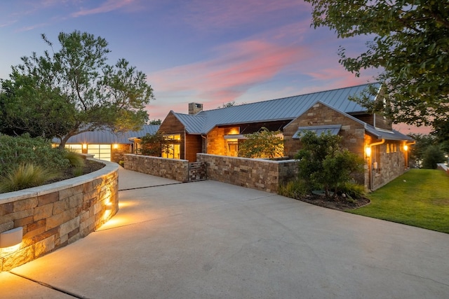 view of front of house with a yard